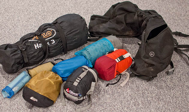 Camping-gear-laid-out-next-to-rear-bag
